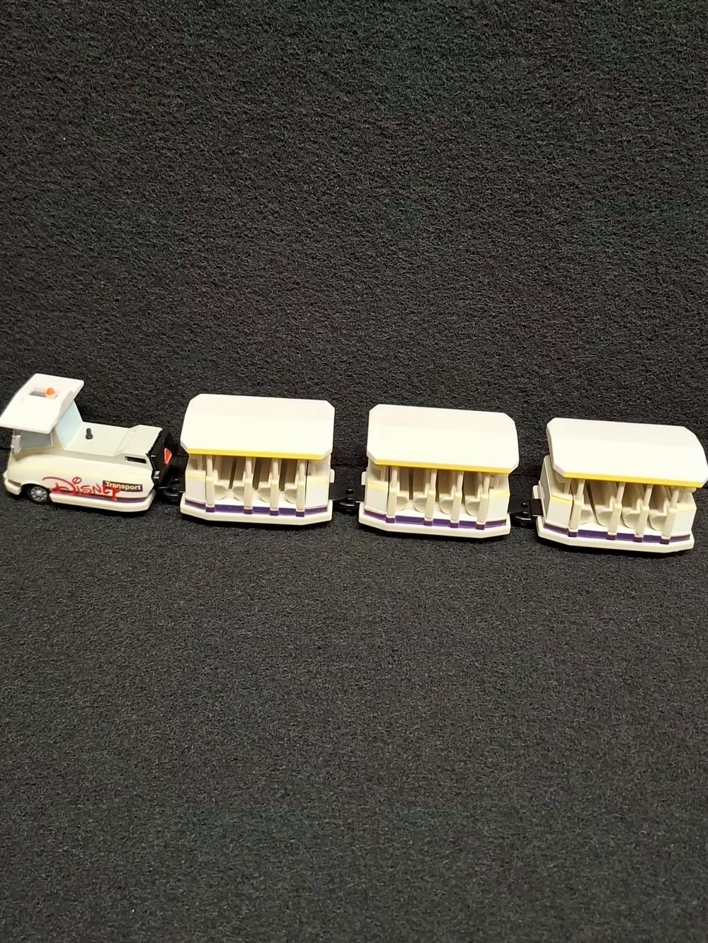 Disney World Parks Parking Lot Tram Transport 4 Piece Die Cast Metal Set Trolley